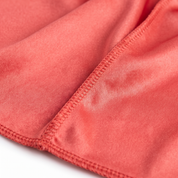 Premium Coral Red Silk Durag fabric close-up showing Coral Red silky satin texture and stitching detail