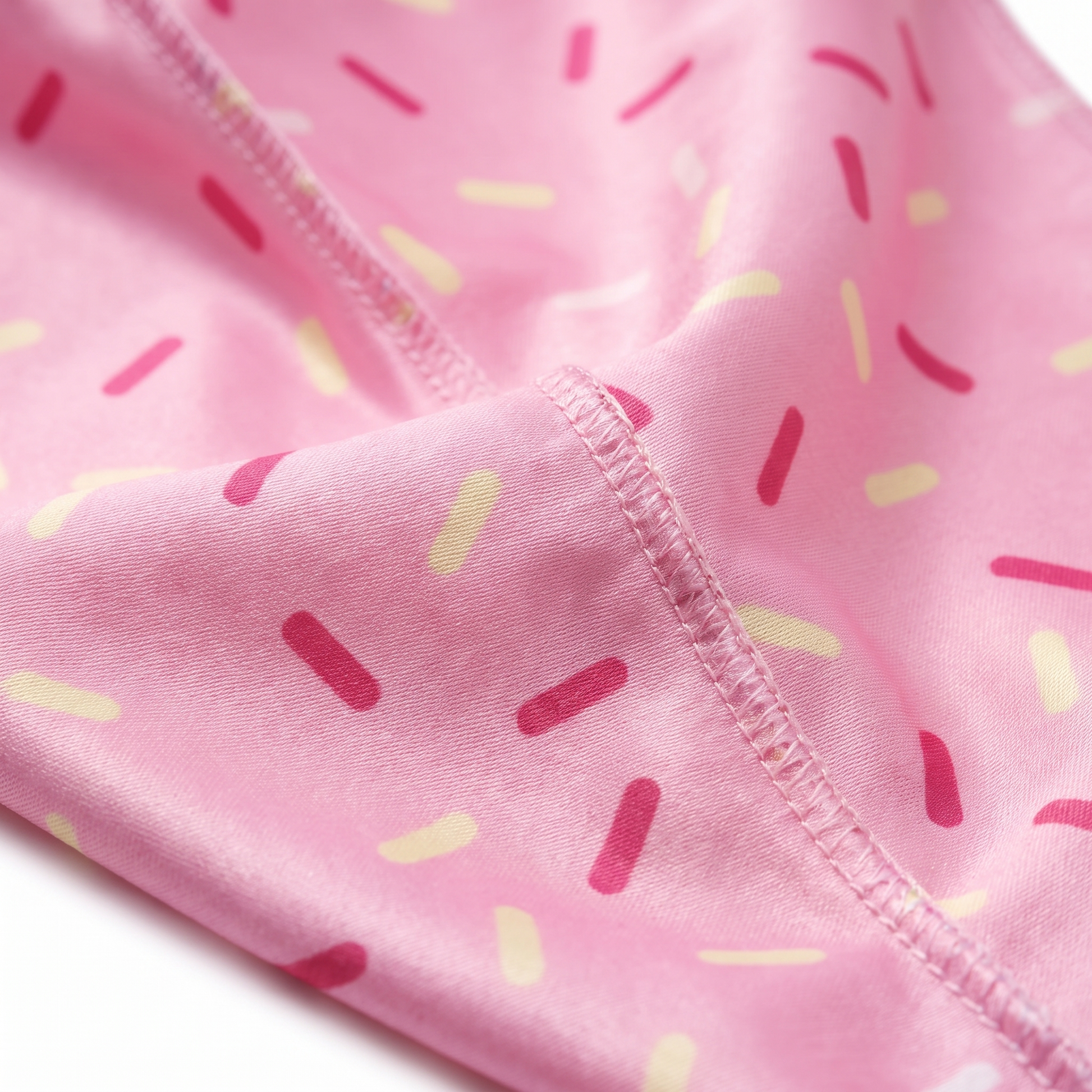 Dark pink ice cream sprinkle Satin Silky Durag fabric close-up showing Dark pink ice cream sprinkle print and stitching detail