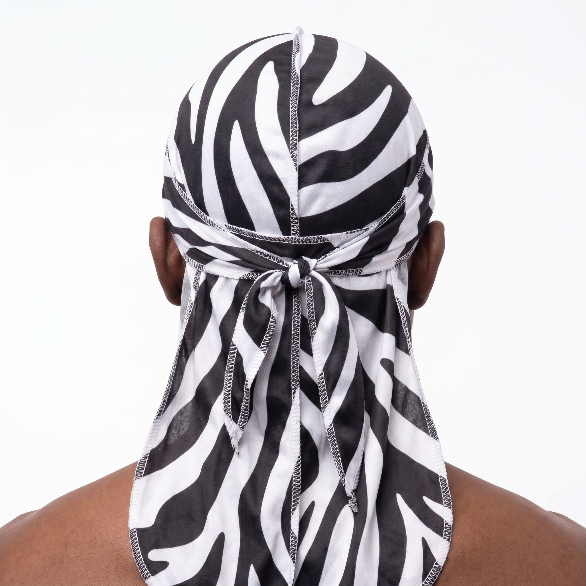 Zebra White animal print Satin Silky Durag worn by male model, back view showing tied wrap and tail