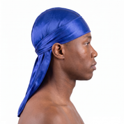Premium Silk Durag Persian Blue worn by male model, side profile showing fit and tail drape