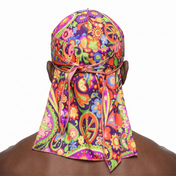 Black Hippie graphic Satin Silky Durag worn by male model, back view showing tied wrap and tail