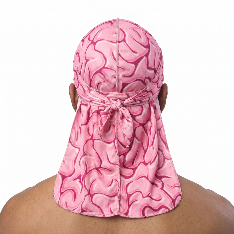 Pink Brains graphic Satin Silky Durag worn by male model, back view showing tied wrap and tail