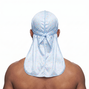 Blue ice cream sprinkle Satin Silky Durag worn by male model, back view showing tied wrap and tail