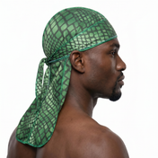 Green reptile snakeskin Satin Silky Durag worn by male model, side profile showing fit and tail drape
