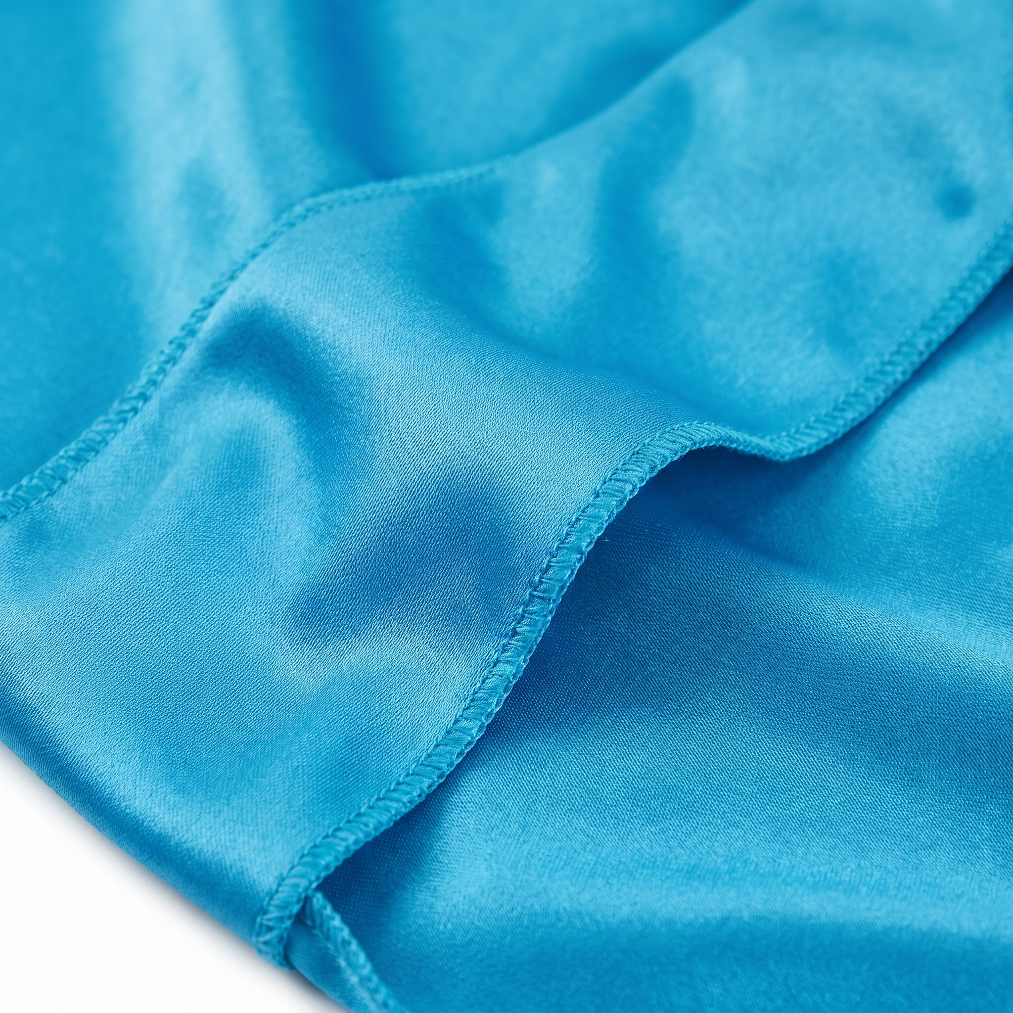 Premium Turquoise Blue Silk Durag fabric close-up showing Turquoise Blue silky satin texture and stitching detail