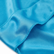 Premium Turquoise Blue Silk Durag fabric close-up showing Turquoise Blue silky satin texture and stitching detail