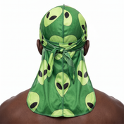 Alien Green graphic Satin Silky Durag worn by male model, back view showing tied wrap and tail