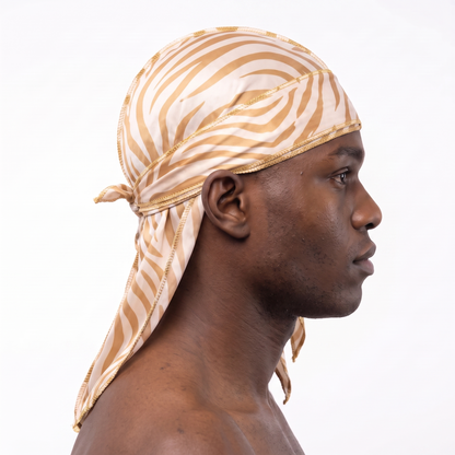 Zebra Cream animal print Satin Silky Durag worn by male model, side profile showing fit and tail drape