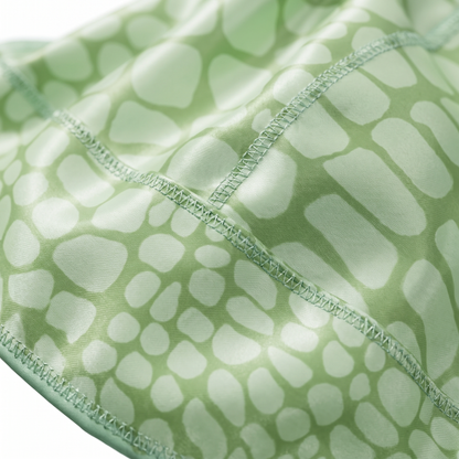 Green crocodile skin Satin Silky Durag fabric close-up showing Green crocodile skin print and stitching detail