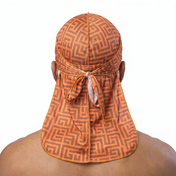 Orange and Brown Maze geometric Satin Silky Durag worn by male model, back view showing tied wrap and tail