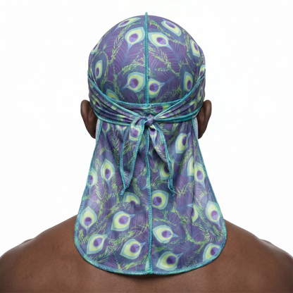 Peacock Shade feather Satin Silky Durag worn by male model, back view showing tied wrap and tail
