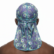 Peacock Shade feather Satin Silky Durag worn by male model, back view showing tied wrap and tail