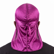 Premium Magenta Purple Silk Durag worn by male model, back view showing tied wrap and tail