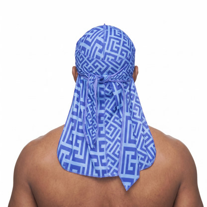Blue Maze geometric Satin Silky Durag worn by male model, back view showing tied wrap and tail