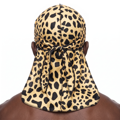 Cheetah spotted animal print Satin Silky Durag worn by male model, back view showing tied wrap and tail