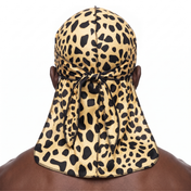 Cheetah spotted animal print Satin Silky Durag worn by male model, back view showing tied wrap and tail