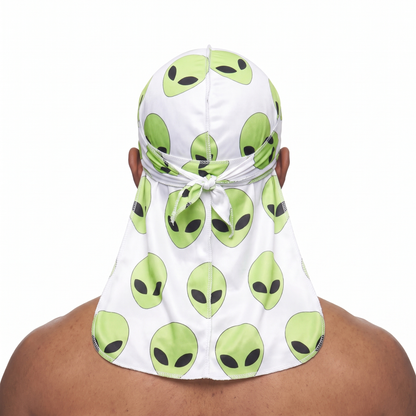 Alien White graphic Satin Silky Durag worn by male model, back view showing tied wrap and tail