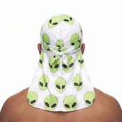 Alien White graphic Satin Silky Durag worn by male model, back view showing tied wrap and tail