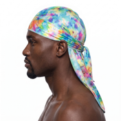 Color Bomb multicolor Tye Dye Satin Silky Durag worn by male model, side profile showing fit and tail drape