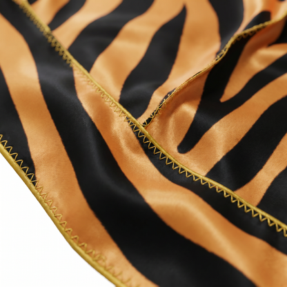 Tiger stripe animal print Satin Silky Durag fabric close-up showing Tiger stripe animal print print and stitching detail