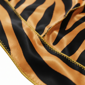 Tiger stripe animal print Satin Silky Durag fabric close-up showing Tiger stripe animal print print and stitching detail