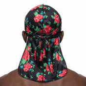 Red Retro Roses floral Satin Silky Durag worn by male model, back view showing tied wrap and tail