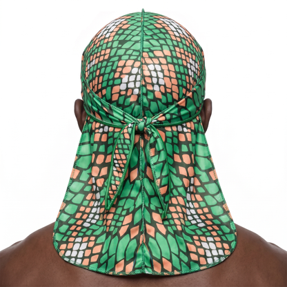Green and Orange Famu reptile snakeskin Satin Silky Durag worn by male model, back view showing tied wrap and tail