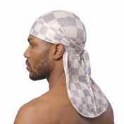 Checkered Cream Satin Silky Durag worn by male model, side profile showing fit and tail drape