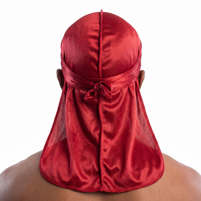Premium Red Silk Durag worn by male model, back view showing tied wrap and tail