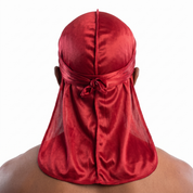 Premium Red Silk Durag worn by male model, back view showing tied wrap and tail