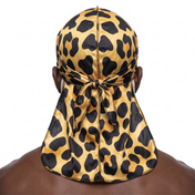 Leopard animal print Satin Silky Durag worn by male model, back view showing tied wrap and tail