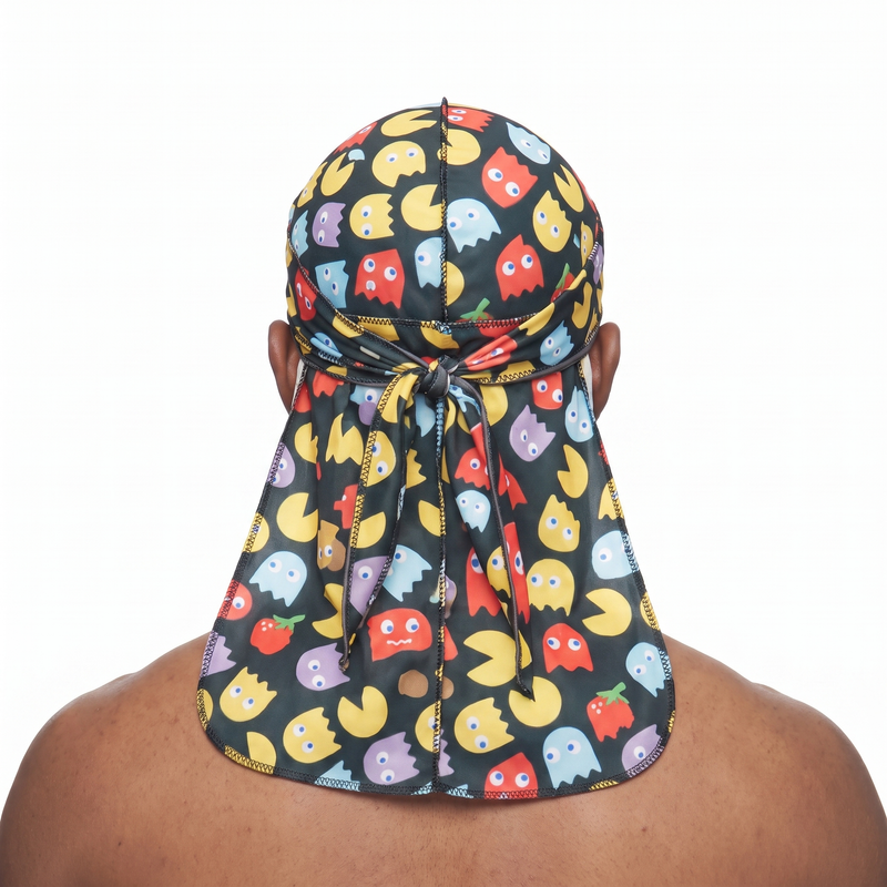 Pac-Man retro arcade Satin Silky Durag worn by male model, back view showing tied wrap and tail