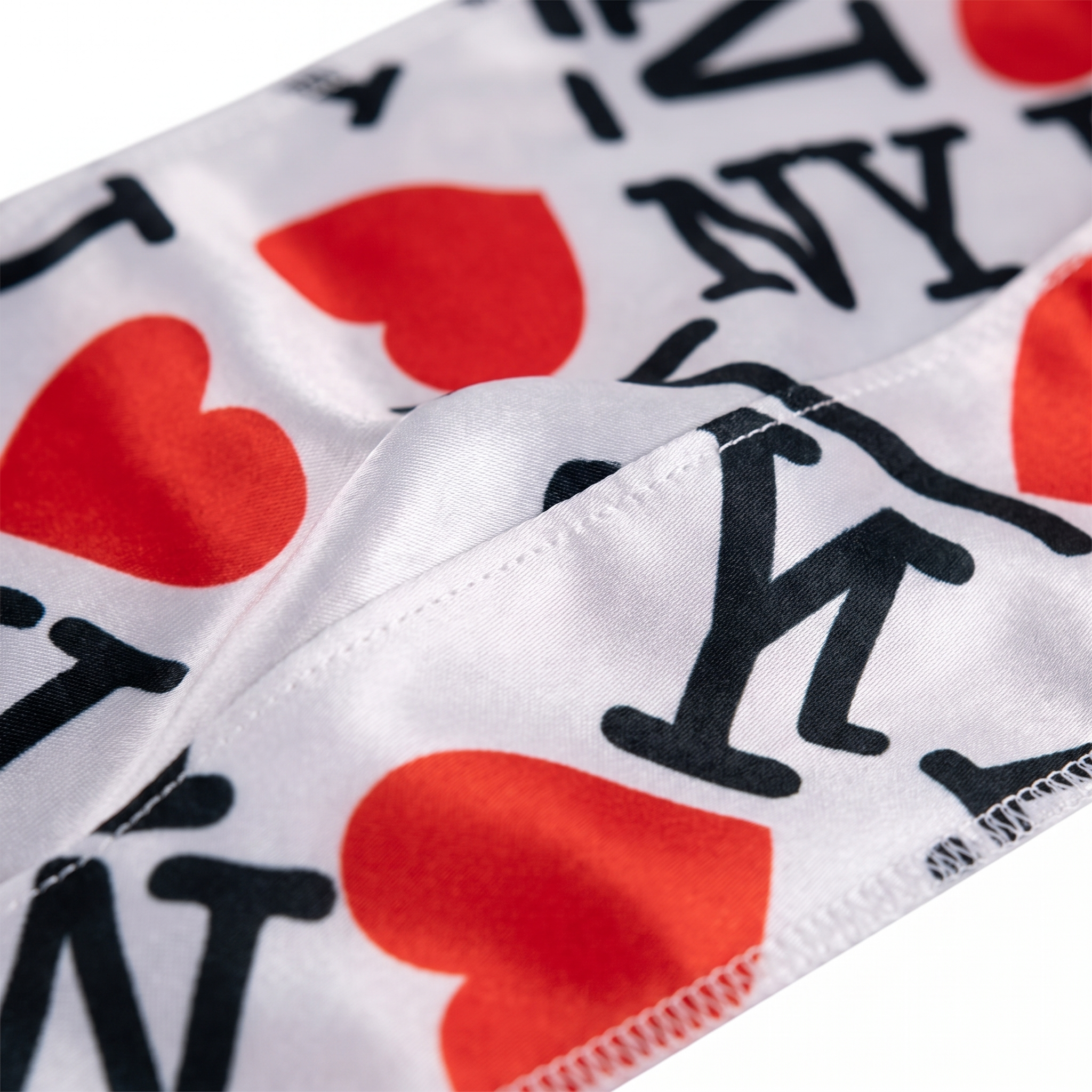 I Love NY graphic Satin Silky Durag fabric close-up showing I Love NY graphic print and stitching detail