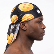 Dragon Ball Z Black Satin Silky Durag worn by male model, side profile showing fit and tail drape