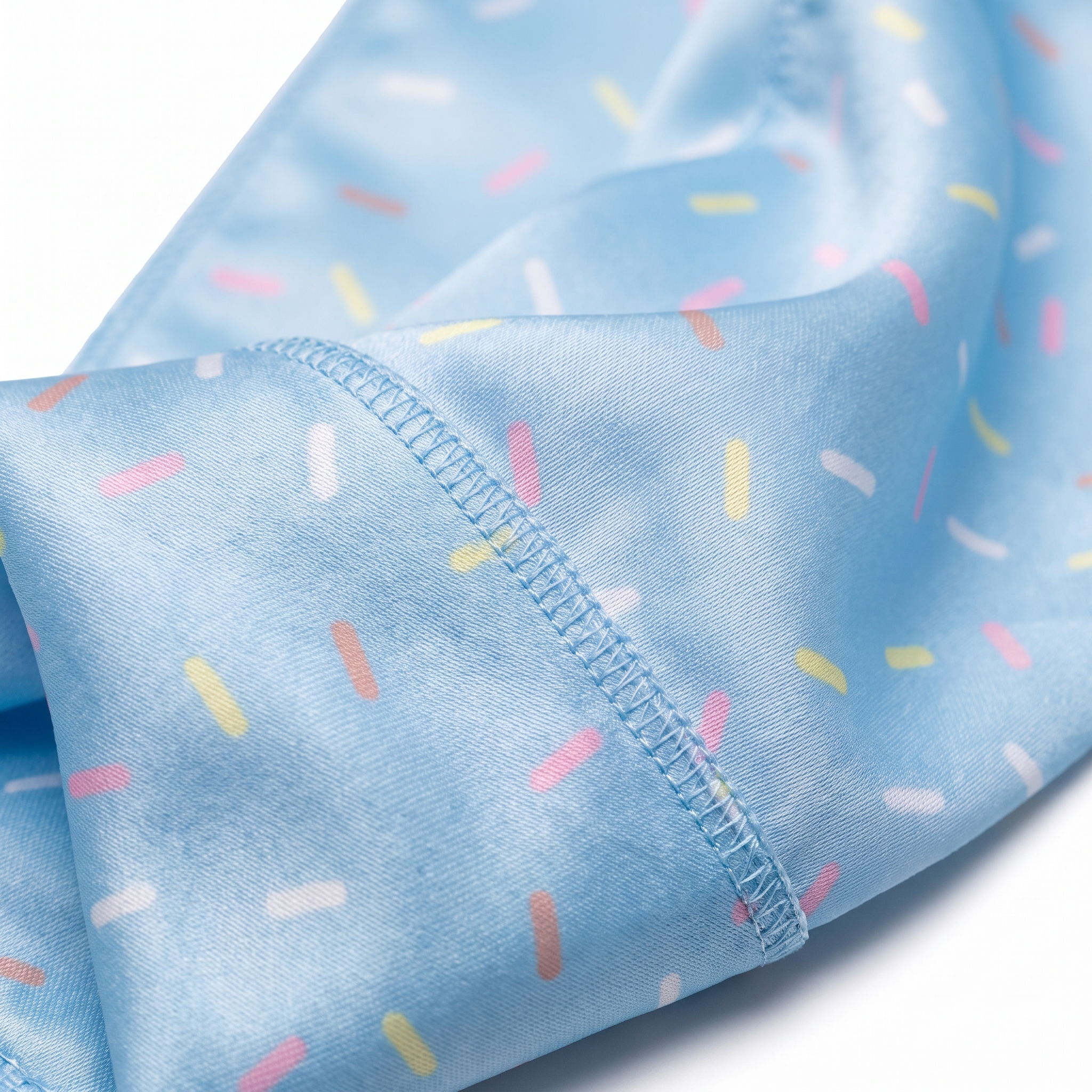 Blue ice cream sprinkle Satin Silky Durag fabric close-up showing Blue ice cream sprinkle print and stitching detail