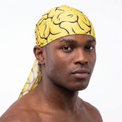 Yellow Brains graphic Satin Silky Durag worn by male model, front view on white background
