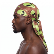Alien Brown graphic Satin Silky Durag worn by male model, side profile showing fit and tail drape